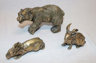 A small bronze figure of a bear,