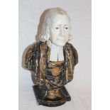 A George III pottery bust figure of John Wesley by Enoch Wood of Burslem,