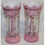 A pair of Victorian pink tinted glass table lustres with painted decoration and glass lozenge