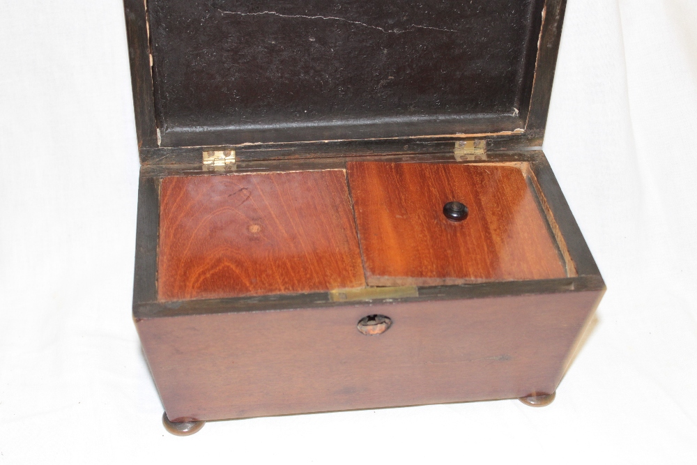 A 19th century mahogany sarcophagus-shaped tea caddy with twin fitted interior - Image 2 of 2