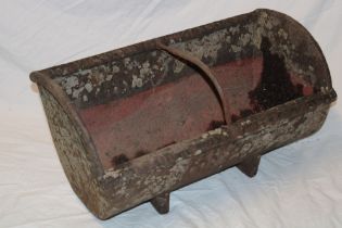 A 19th century Cornish cast-iron animal feeding trough with central bar division,