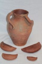 A Lake's Truro pottery terracotta three-handled vase,