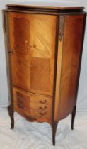 A French Kingwood side cabinet with shelves enclosed by a central door above three small drawers