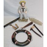 Various nautical related items including Victorian Staffordshire pottery figure of a sailor,