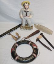Various nautical related items including Victorian Staffordshire pottery figure of a sailor,