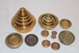 A selection of old brass weights including a stack of Avery brass weights 4lb - ½oz,