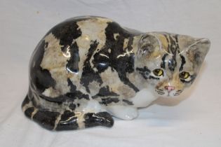 A Winstanley pottery cat figure with glass eyes,