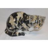 A Winstanley pottery cat figure with glass eyes,