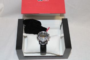 A gentleman's sports-style wristwatch by Tissot in original box