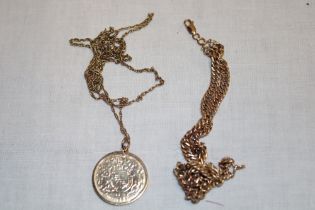 A 9ct gold twin strand flat link bracelet and a 9ct gold 1977 commemorative pendant with chain (2)