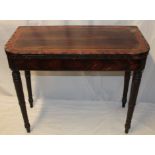 A 19th century rosewood and satinwood rectangular turn-over-top card table on turned tapered legs