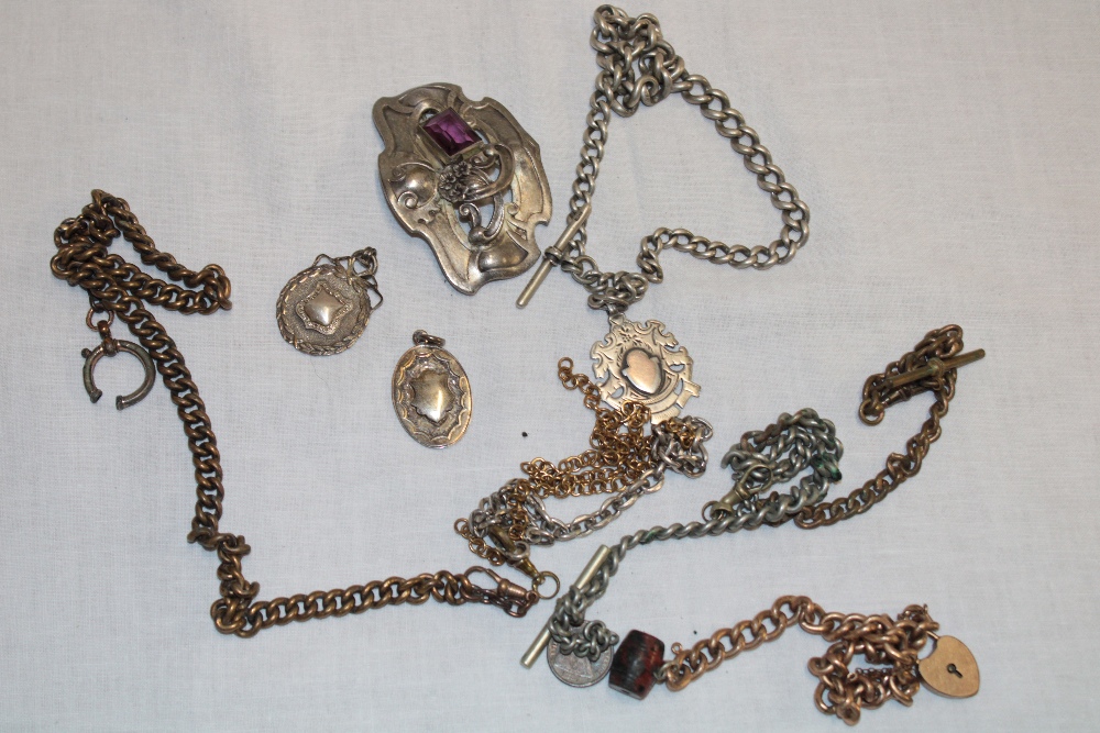 A silver pocket-watch chain, various other pocket-watch chains, silver fobs etc.