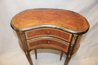 A reproduction French inlaid mahogany and rosewood kidney-shaped chest of two small curved drawers