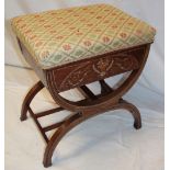 A late Victorian inlaid mahogany rectangular piano stool with upholstered box seat on X-frame legs