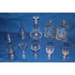 Two 19th century glass rectangular graduated liqueur decanters with etched floral decoration,