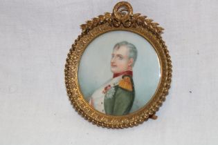 A miniature watercolour depicting a bust portrait of Napoleon signed Castel,