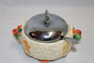 A Clarice Cliff "Celtic Harvest" Newport Pottery circular preserve jar with chromium-plated lid