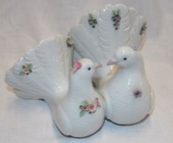 A good quality Lladro china figure of a pair of doves with raised floral decoration,