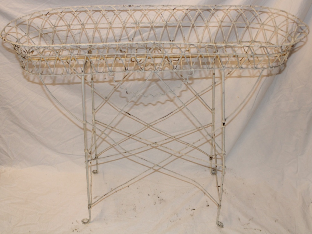 A painted wire-work plant trough,