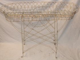 A painted wire-work plant trough,