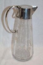 A Victorian cut-glass tapered claret jug with silver mounted lid and handle, London marks 1889,