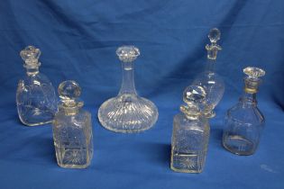 A pair of cut-glass square-shaped decanters and stoppers,