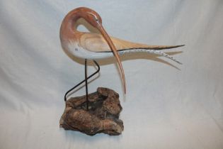 A Cornish carved wood figure of a curlew by Geoffrey Bickley of St.