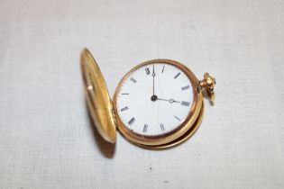 A ladies' 18ct gold fob watch with circular enamelled dial and blue enamelled case (af)