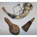 A 19th century brass mounted copper powder flask by Hawksley with dead game decoration,
