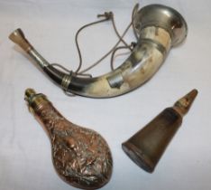 A 19th century brass mounted copper powder flask by Hawksley with dead game decoration,