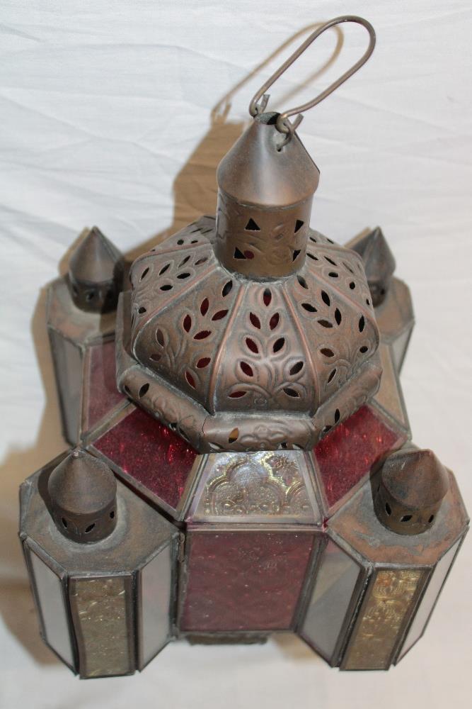 An unusual brass hanging pulpit lamp with red, amber and clear tinted glass panels, - Image 2 of 2