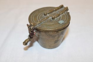 A set of 19th century bronze stacking cup weights enclosed by a hinged cover 1½" high