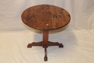 An unusual rustic oak circular occasional table,