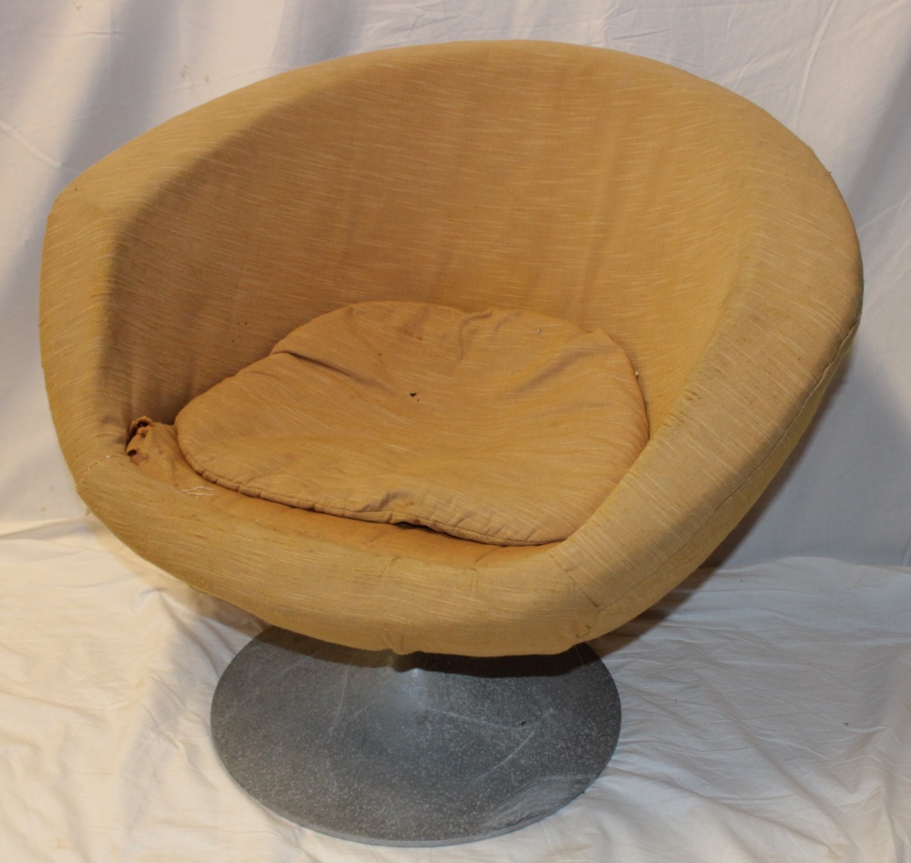 A 1960's swivel tub lounge chair on aluminium pedestal base (af)