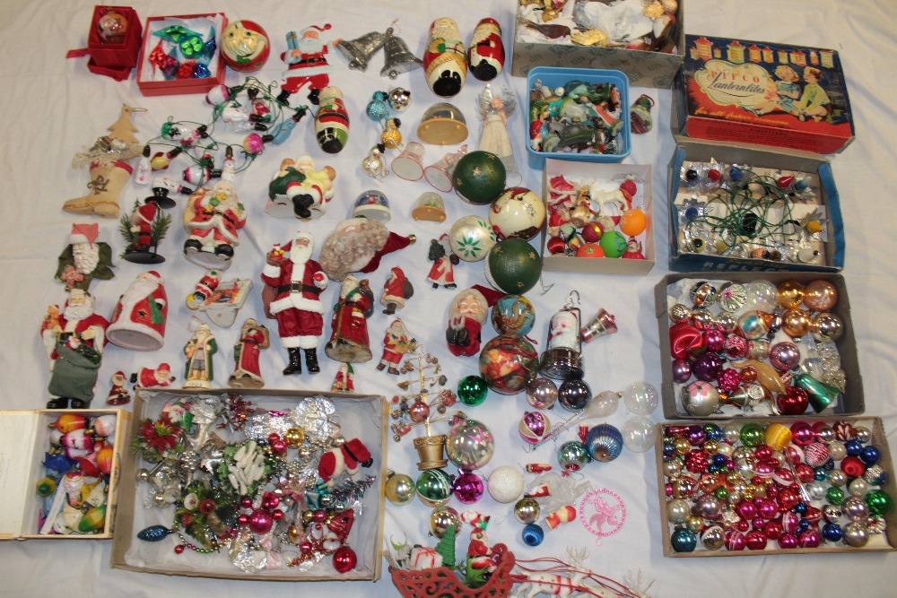 A selection of vintage Christmas decorations including boxed Pifco lantern lights, various baubles,