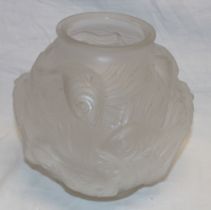 A Czechoslovakian frosted glass circular vase decorated in relief,