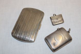 A silver rectangular vesta case with ribbed decoration,