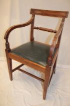 A 19th century mahogany carver arm chair with rope twist back and upholstered seat on square