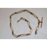 A good quality 18ct gold multi-link pocket watch chain with T-bar (87.