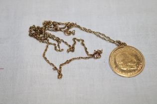 A 9ct gold pendant mounted with a 1977 9ct gold commemorative coin together with chain (7.