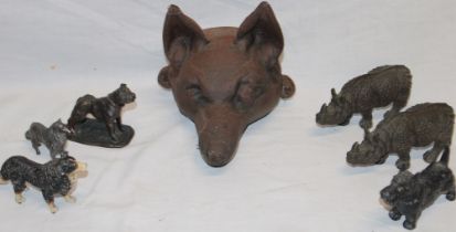 An old cast-iron fox wall mask, 6½" long, two cast-iron rhinoceros figures, 5" long,