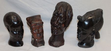 An African carved wood figure of a male head,
