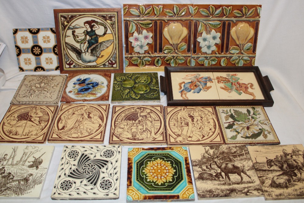 A selection of 19th century ceramic tiles including Jackfield female and swan decorated tile,
