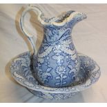 A 19th century Staffordshire pottery baluster-shaped water jug with blue and white floral