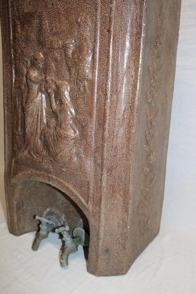 An old Continental pottery rectangular water filter with figure decoration and two base taps, - Image 2 of 3