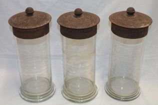 Three early matching glass Rowntrees Gum dispensing jars with embossed metal lids,