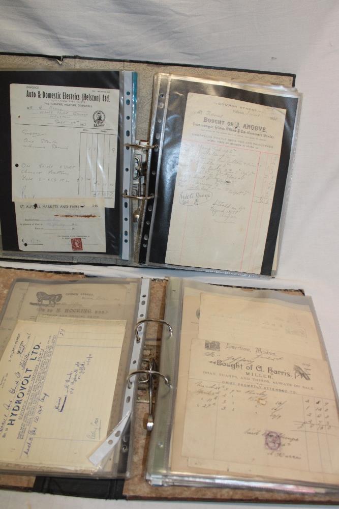Two folders containing a large selection of various Helston related paperwork and receipts