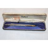 A boxed Parker 45 fountain pen