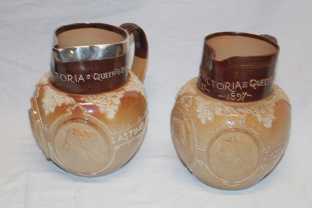 A pair of 19th century Doulton Lambeth pottery Victorian commemorative graduated jugs "Victorian - Image 2 of 2