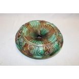 A 19th century majolica glazed circular spittoon with raised grape and leaf decoration,